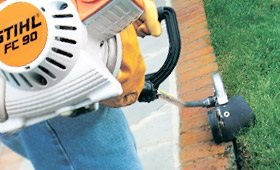Stihl Curved edger for cleaning up overgrown grass  Driveway Edging