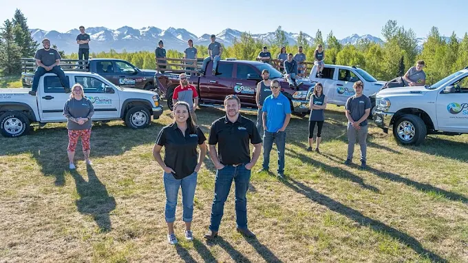 Alaska Premier Services team and fleet providing commercial and residential lawn care and snow management in Anchorage.